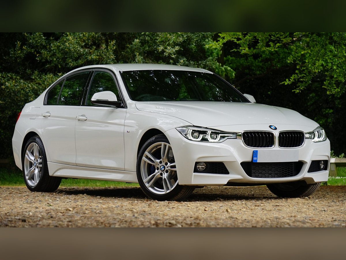 White sedan for sale at Approved Auto